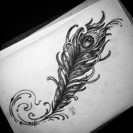 Тату перо павлина