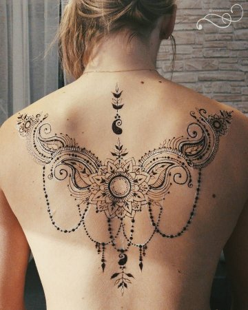 Тату на спине женские узоры