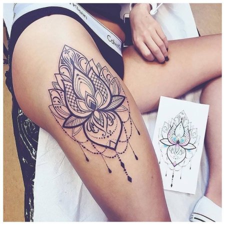 Тату на бедре для девушек