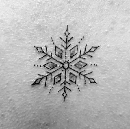 Тату Снежинка