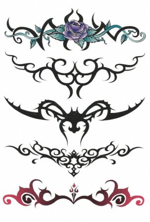 Тату трайбл на пояснице женские