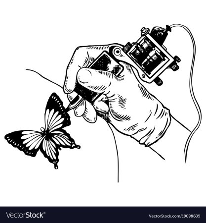 Тату машинка в руке