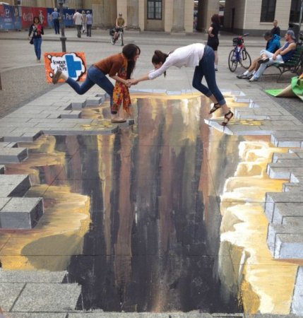 Уличное искусство на асфальте