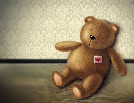 Плюшевый медведь на полу