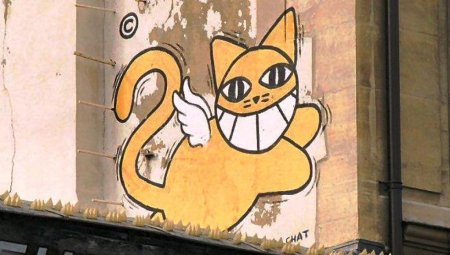 Граффити кота улыбающегося