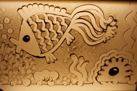 Рисование песком