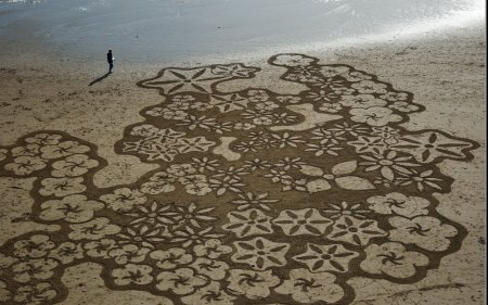 Андрес Амадор рисунки на песке