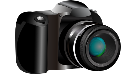 Фотоаппарат на белом фоне