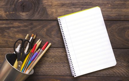 Блокнот с ручкой