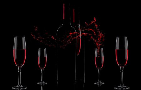 Красное вино на черном фоне