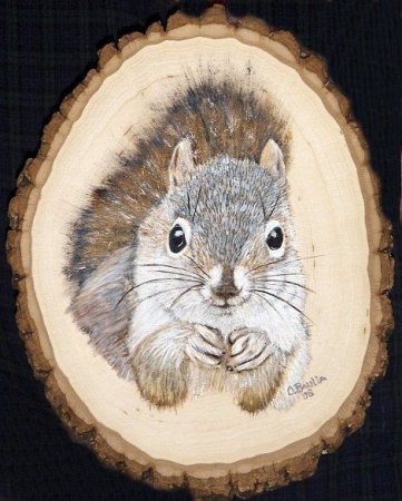 Животные на спиле дерева