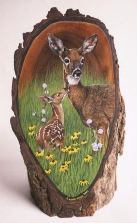 Зайчик на спиле дерева