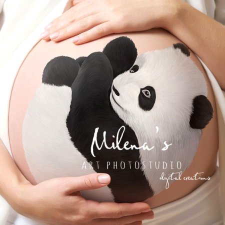 Панда на животе беременной