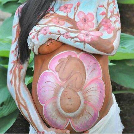 Бодиарт беременных животиков