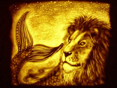 Рисование песком животных