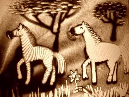 Рисование песком животных