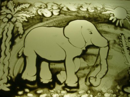 Рисование песком животных