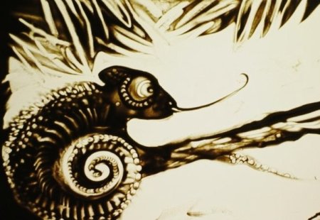 Рисование песком животное