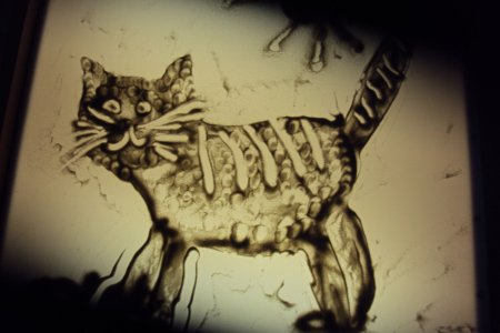 Рисование песком животные