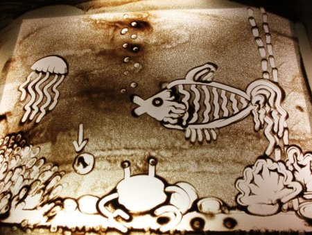 Рисование песком море