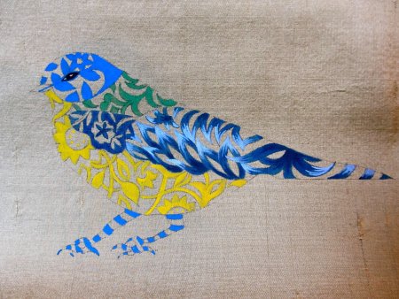Ткань узором птичка