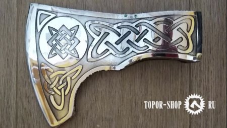 Славянские символы на Топорах