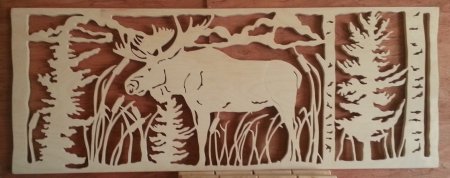 Прорезная резьба по дереву Лось