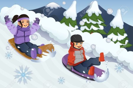 Дети катаются со снежной горки