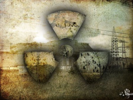 Значок радиации на черном фоне