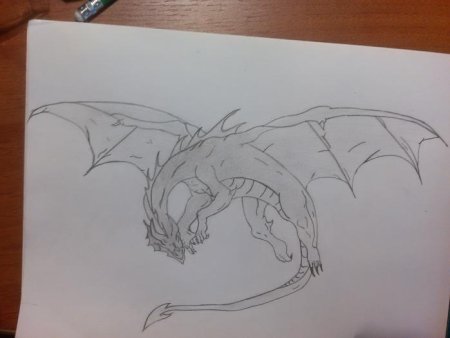 Нарисовать дракона на листке