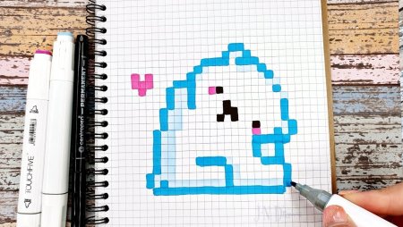 Маленькие рисунки по клеточкам в маленьком блокноте