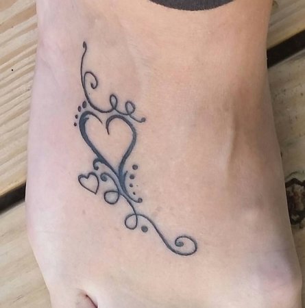 Татуировки для девушек на ноге узоры