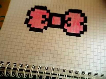 По клеточкам в тетради бантик