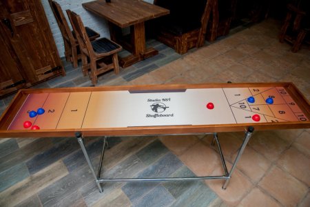 Адаптивная игра шаффлборд