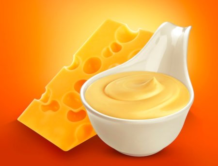 Сырный соус на белом фоне