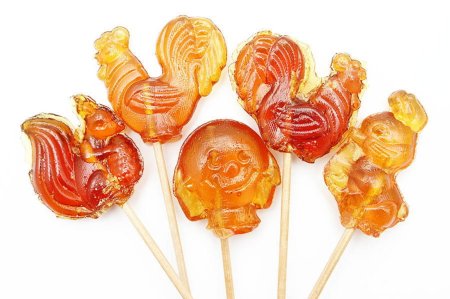 Сосательная конфета петушок